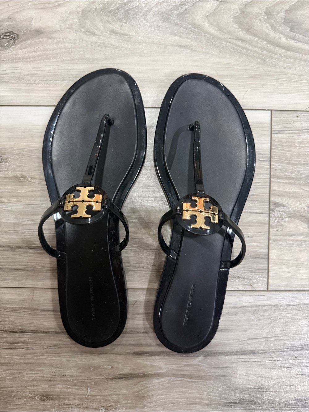 Tory Burch Black Patent Logo Thong Sandals with Gold Emblem